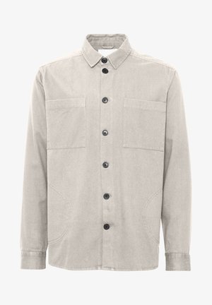 Svetlo siva bombažna srajca z gumbom spredaj, dvema žepoma na prsih in klasičnim ovratnikom. Ima črne gumbe in ukrivljene stranske šive.