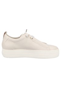Light beige leather sneaker with a textured surface, white rubber sole, and adjustable white laces. Features metallic eyelets and a looped heel tab.