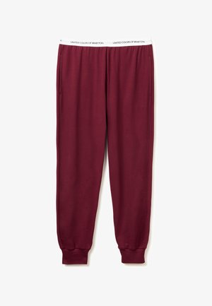 Bordeaux sweatpants met zijzakken, elastische boorden en een witte elastische tailleband met het label "United Colors of Benetton".