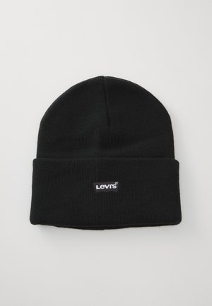 Zwarte gebreide beanie met een omgeslagen boord. Voorzien van een klein, wit Levi's logo label aan de voorkant. Zachte textuur en een snug fit.