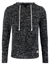 Felpa a cappuccio a righe bianche e nere realizzata in materiale lavorato a maglia, con tasca frontale, maniche lunghe e lacci bianchi sul cappuccio.
