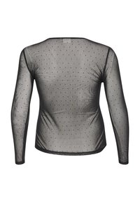 Haut noir transparent à manches longues avec petits pois et encolure ronde, vu de dos sur un fond blanc.