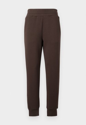 Pantalons de survêtement marron foncé à jambes droites avec une taille élastique et des poignets, présentés à plat sur un fond blanc.