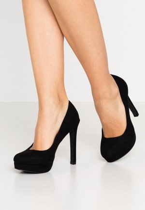 Højhælede pumps - black