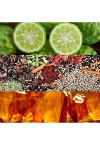 Moitiés de bergamote avec une peau verte texturée, diverses épices incluant l'anis étoilé et la cannelle, ainsi que des morceaux cristallins de couleur ambre.