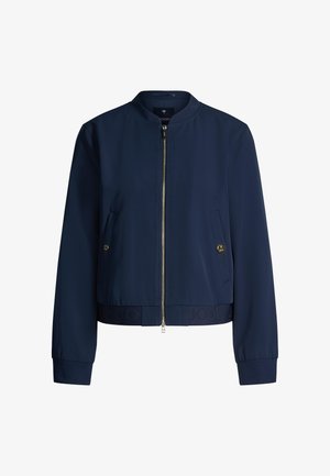 Blouson aviateur bleu marine avec fermeture éclair frontale, deux poches obliques agrémentées de boutons dorés, poignets et taille côtelés.