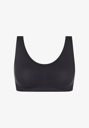 Zwarte naadloze draadloze sportbeha met ronde halslijn en brede schouderbanden, ontworpen voor comfort en ondersteuning.