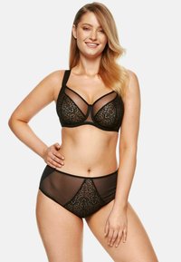 Czarny zestaw bielizny składający się z koronkowego biustonosza z przezroczystymi detalami oraz majtek w wysokim talii z koronkowymi akcentami. Gładka tekstura, uporządkowany design.