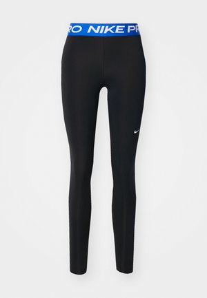 Leggings de sport noirs avec une taille bleue arborant le texte "NIKE PRO". Texture lisse avec un petit logo blanc près de la cheville.