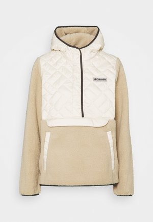 Beige-värinen fleece-pusero, jossa tikattu valkoinen ylävartalo ja huppu, etutasku sekä Columbian logo rinnassa.