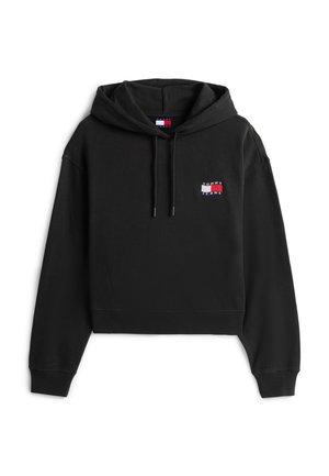 Hoodie noir court avec cordons de serrage et petite étiquette logo Tommy Jeans sur la poitrine gauche.