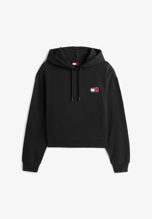 Hoodie noir court avec cordons de serrage et petite étiquette logo Tommy Jeans sur la poitrine gauche.