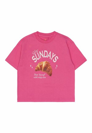Pink cotton t-shirt with short sleeves, round neckline, featuring a croissant graphic and text that reads "Slow Sundays" and "Treat Yourself."
