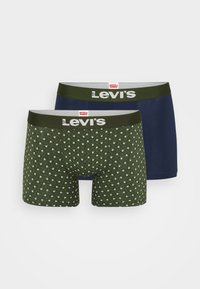 Két pár Levi's boxer: az egyik egyszínű tengerészkék, a másik sötétzöld, geometrikus mintával. Mindkettő kontrasztos fekete derékkel rendelkezik, logo-val.