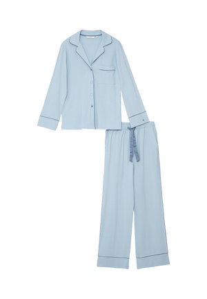 Light blue long-sleeve button-up pajama top with chest pocket and matching loose pants with drawstring waist, both with dark trim details.