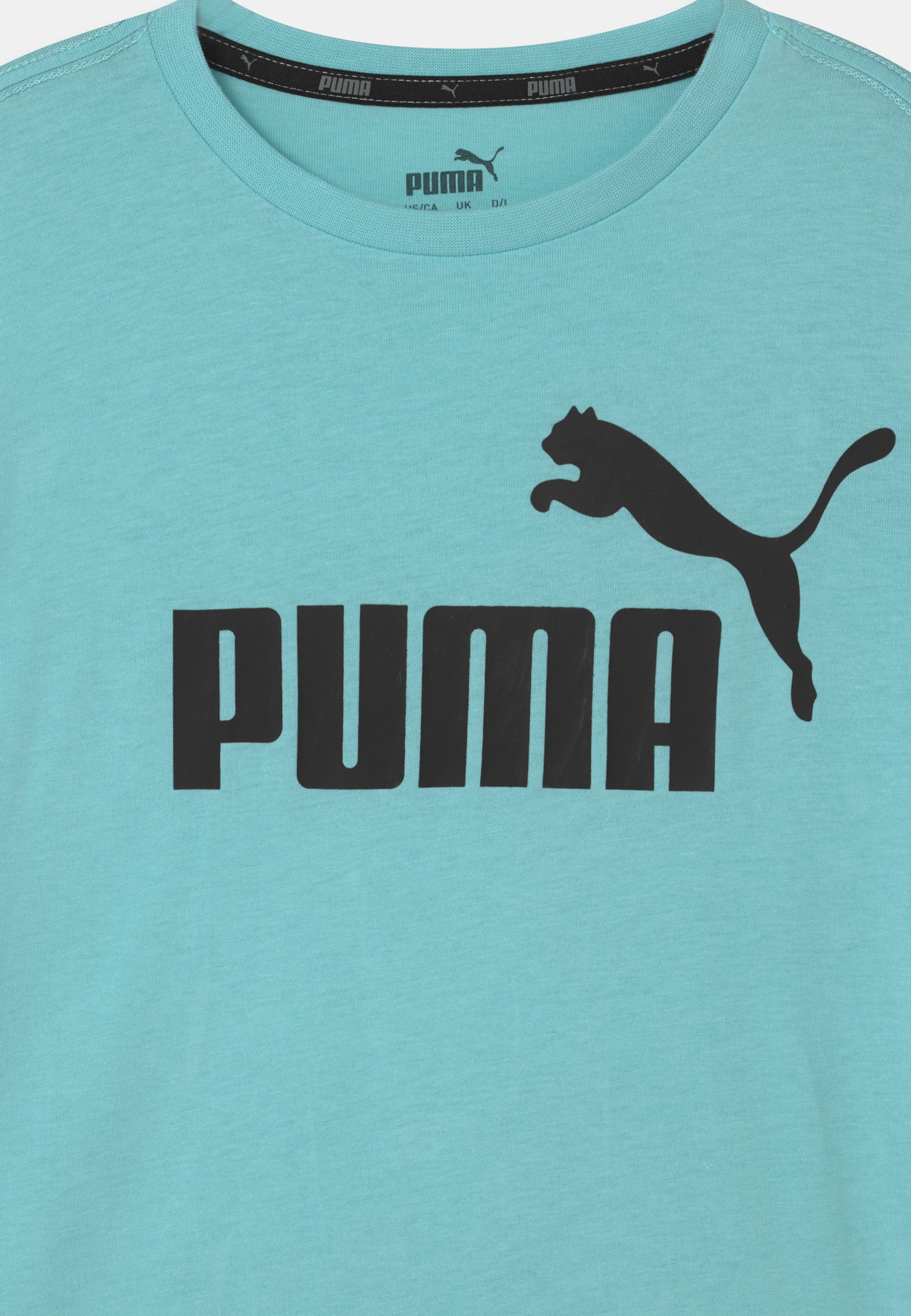 light blue puma shirt