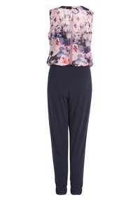 Combinaison sans manches avec haut floral violet et rose, pantalon uni bleu marine, dotée d'une fermeture éclair au dos et d'un pantalon à coupe décontractée.