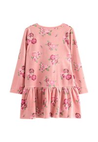 Long-sleeve dress in pink fabric, features a floral pattern with roses and leaves, and a gathered ruffled hem at the bottom.