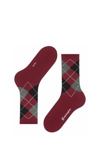 Chaussettes en coton rouge avec un motif argyle en gris, noir et blanc, comportant un logo sur la semelle et un haut côtelé pour un ajustement sécurisé.