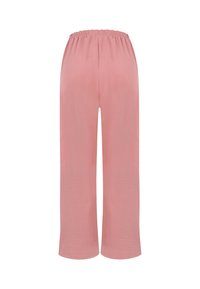 Pantalon rose ample avec une taille élastique et des jambes larges, présenté de dos sur un fond blanc uni.