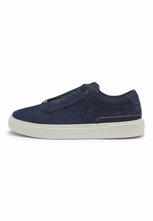 Navy blue low-top sneaker with white thick sole, minimal stitching, and black laces, shown from side view on white background.