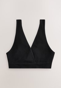 Sort ribbet bralette med V-udskæring og brede stropper. Har et tekstureret stof og en solid underbånd for støtte.