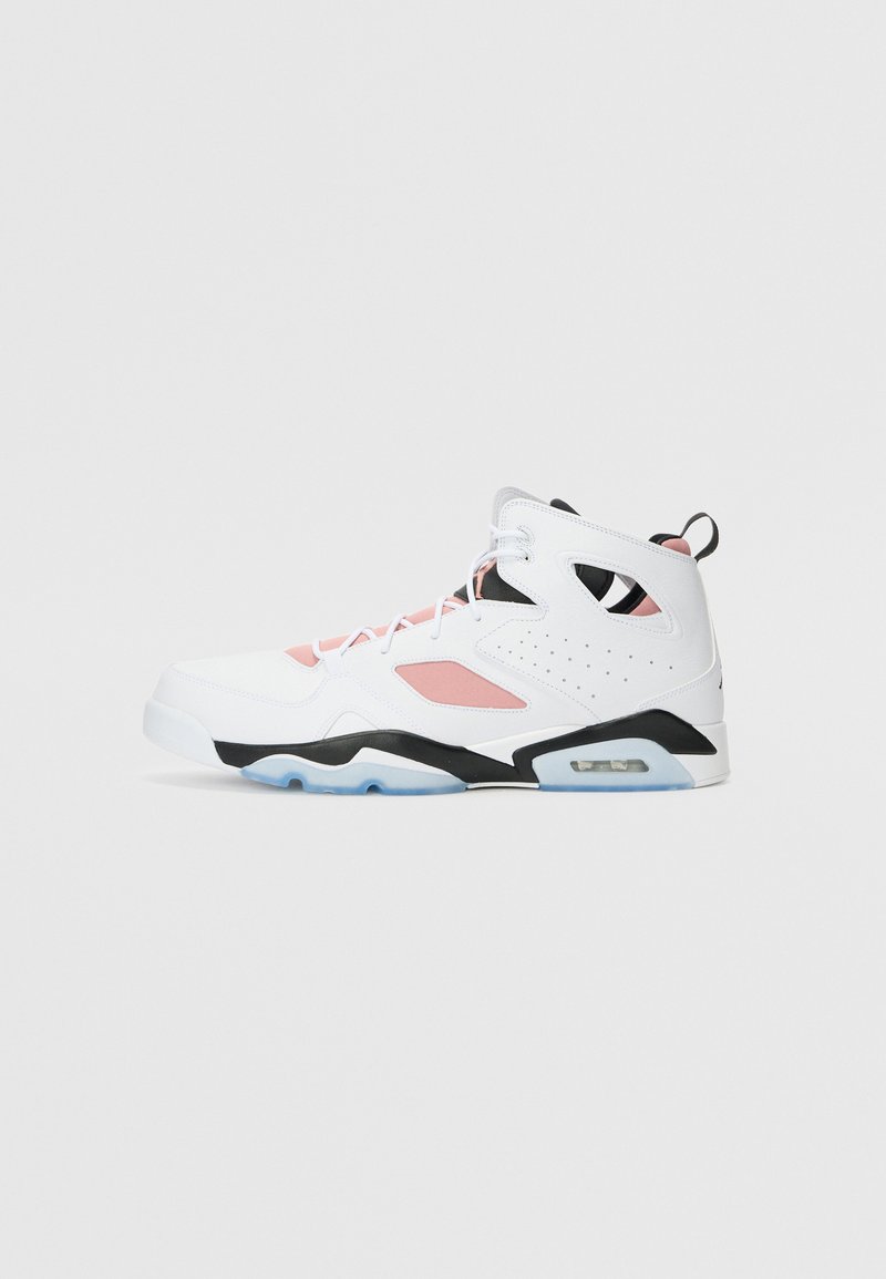 White athletic shoe with pink accents, black sole, and textured side panel. Features a padded collar and clear outsole.