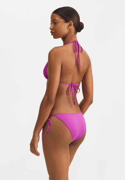 Fuchsia bikini set with a triangular top and adjustable tie closures. Smooth material and minimal coverage style.