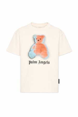T-shirt blanc manches courtes avec un motif flou d'un ours en peluche orange et bleu et le texte "Palm Angels" en police gothique noire sous l'ours.
