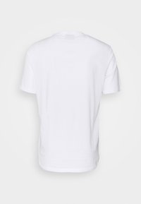 T-shirt blanc uni à manches courtes, vu de dos, avec un col rond et une coupe standard.