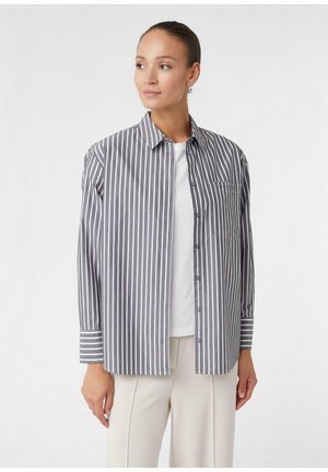 Gray and white striped shirt with a collar, button front, and single chest pocket. Long sleeves with contrasting striped cuffs.