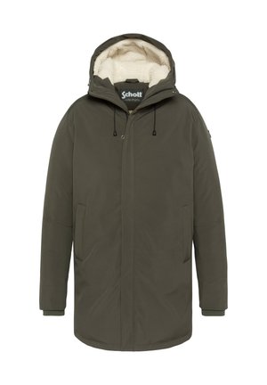 Parka d'hiver vert foncé avec capuche doublée en polaire blanche, fermeture éclair avant avec boutons pression et deux poches latérales.