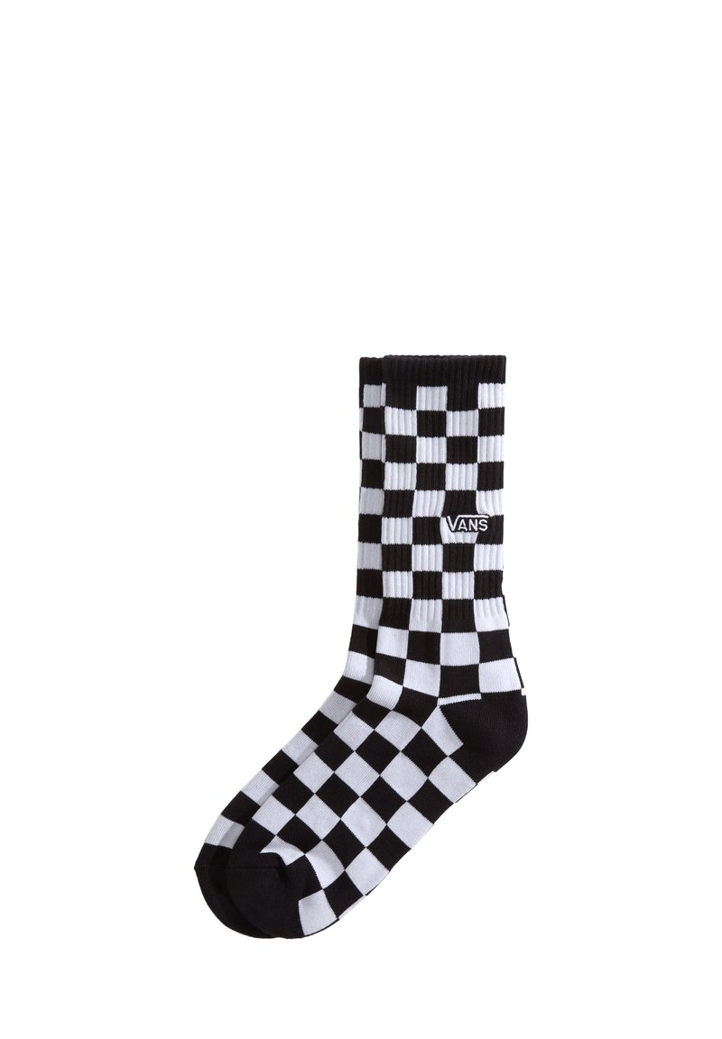 Calzino in cotone a trama a scacchi bianco e nero con parte superiore a coste. Presenta il logo Vans sul lato. Materiale leggero e traspirante. Altezza standard da crew.