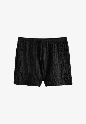 Svarta shorts i texturerad tyg, med ett elastiskt midjeband och dragsko. Ytan har ett subtilt, ruggat mönster.