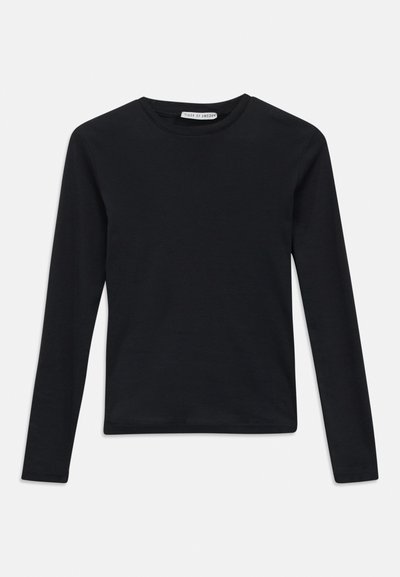 Svart långärmad t-shirt med rund halsringning och smal passform, enkel design och en liten etikett "Tiger of Sweden" inuti kragen.