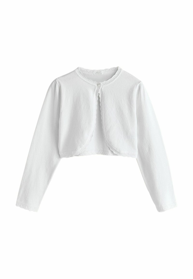 Cárdigan corto blanco con mangas largas, hecho de una tela suave. Presenta bordes ondulados y un cierre de un solo botón en la parte delantera.