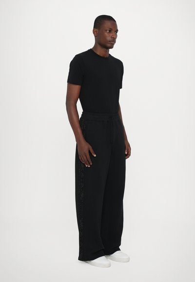 Les Benjamins Παντελόνι φόρμας - black