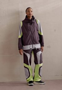 adidas by Stella McCartney Trainingsvest - mineral red/pulse lime