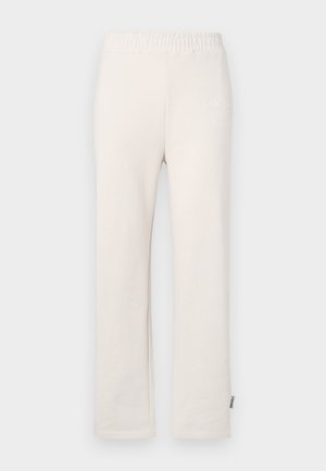 Beige cotton sweatpants with an elastic waistband and embroidered logo. Straight-leg design with a smooth texture and subtle stitching details.