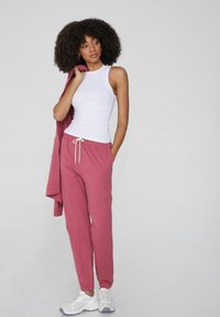 Tezenis MIT PASPELTASCHEN UND TUNNELZUG - Teplákové kalhoty - Pink