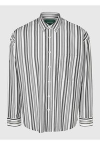 Stripete skjorte i svart og hvitt, med knappelukking foran, spiss krage, lange ermer og brystlomme. Laget av bomull.