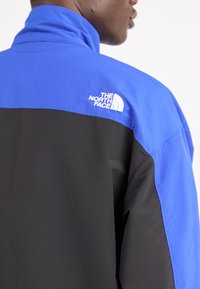 The North Face EASY WIND TRACK JACKET - Suvejakk - blue/black