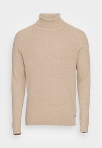 Jersey de cuello alto beige hecho de tela de punto texturizada. Cuenta con mangas largas y ribete acanalado en el cuello y el dobladillo. Sin patrones visibles.