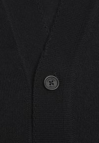 Cardigan negru din material tricotat texturat, cu un decolteu în V și un buton rotund negru proeminent marcat cu "SCALPERS."