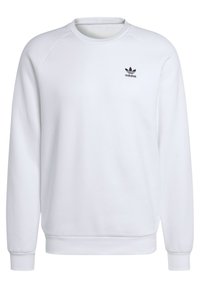 Bílá mikina z měkké látky s kulatým výstřihem, raglánovými rukávy, žebrovanými manžetami a malým černým logem Adidas na hrudi.
