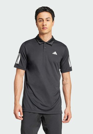 Polo noir avec col et trois boutons, arborant un logo blanc sur la poitrine gauche et des rayures blanches sur les manches. Tissu léger.