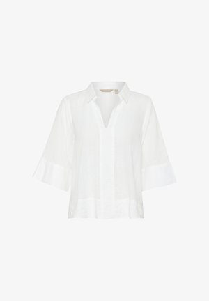 Valge lühikeste varrukatega pluus, millel on nupukrae, tekstureeritud kangas ja lahtine lõige. Rikkustatud laiade varrukate ja sirge äärisega.