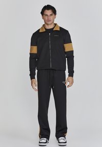 TRACK - Chaqueta de entrenamiento - black