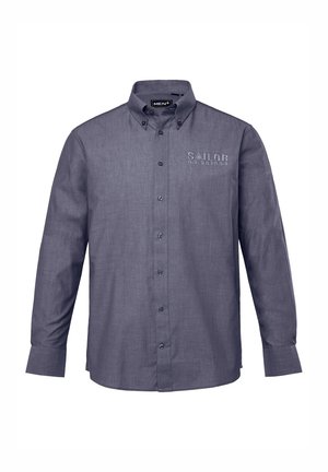 Košile s dlouhým rukávem, na knoflíky, v tmavě šedé látce. Má klasický límec, p�řední kapsy a vyšívaný detail "SAILOR 63.261634".