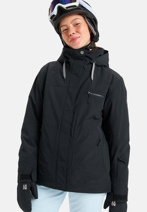 Black ski jacket with hood, zippered pockets, adjustable drawstrings, and textured fabric. Worn with gloves and a helmet, against a plain background.